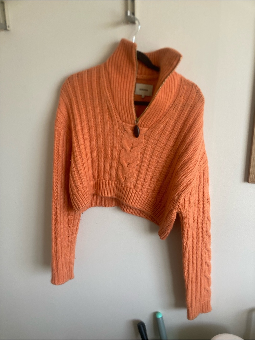 Nanushka Cropped Eria Cable-Knit Turtleneck Sweater in Orange